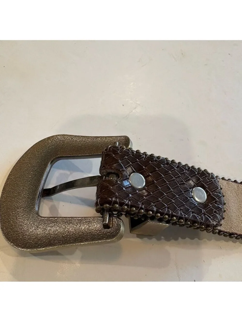 Brown leather belt adorned with amber stones and burnished gold studs. Size 24